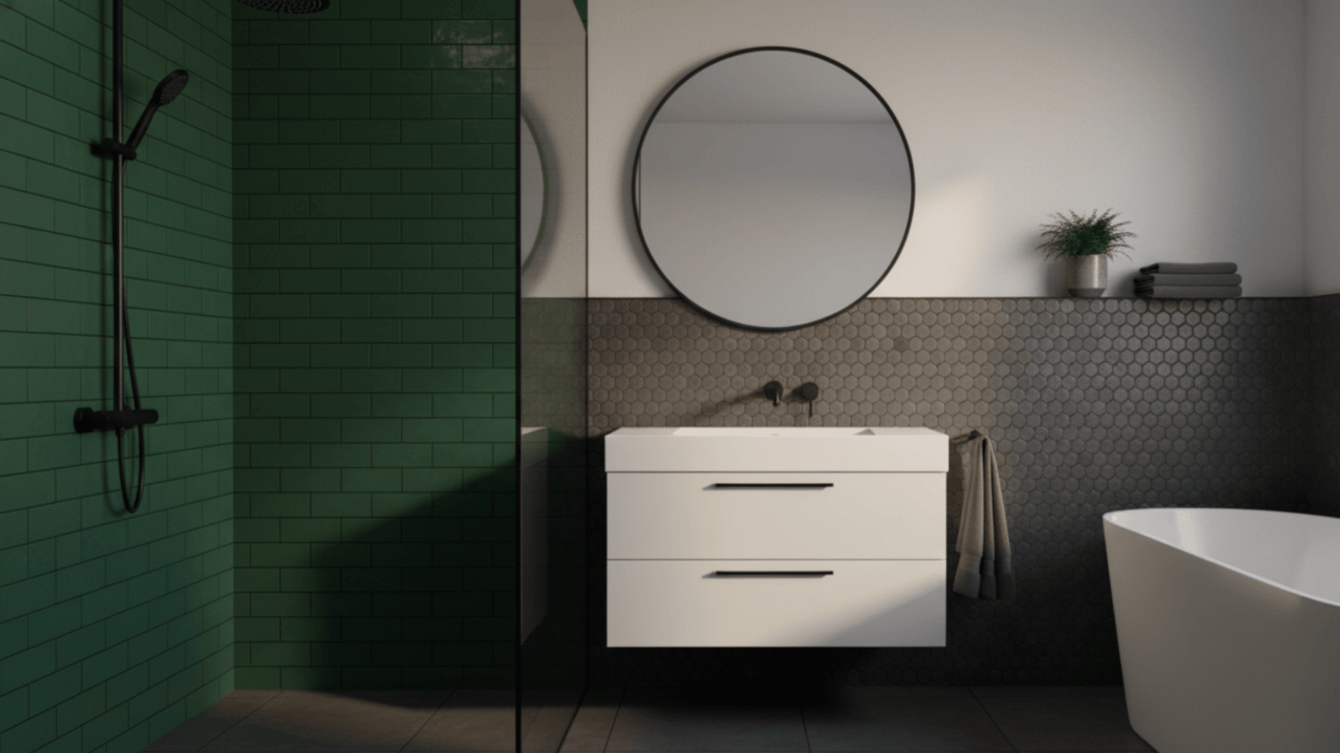 A mix of dark green and charcoal gray tiles in a modern geometric shower design.