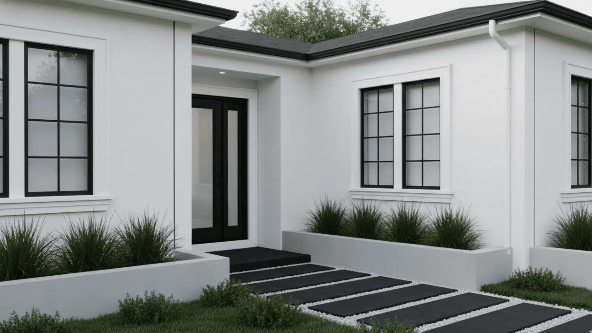 Minimal white exterior with black framed windows, sleek entry steps, and clean landscaping design