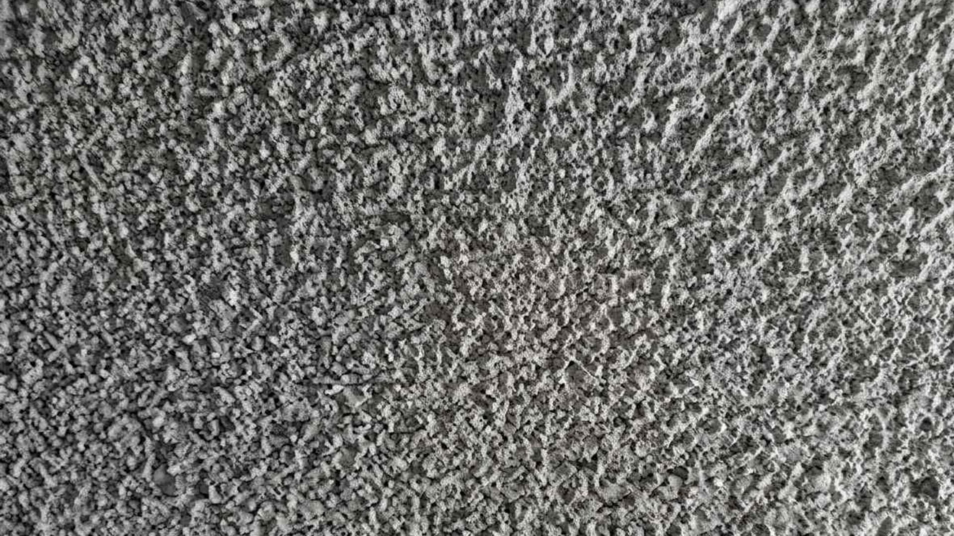 Popcorn ceiling texture with dense, bumpy surface and clustered granules