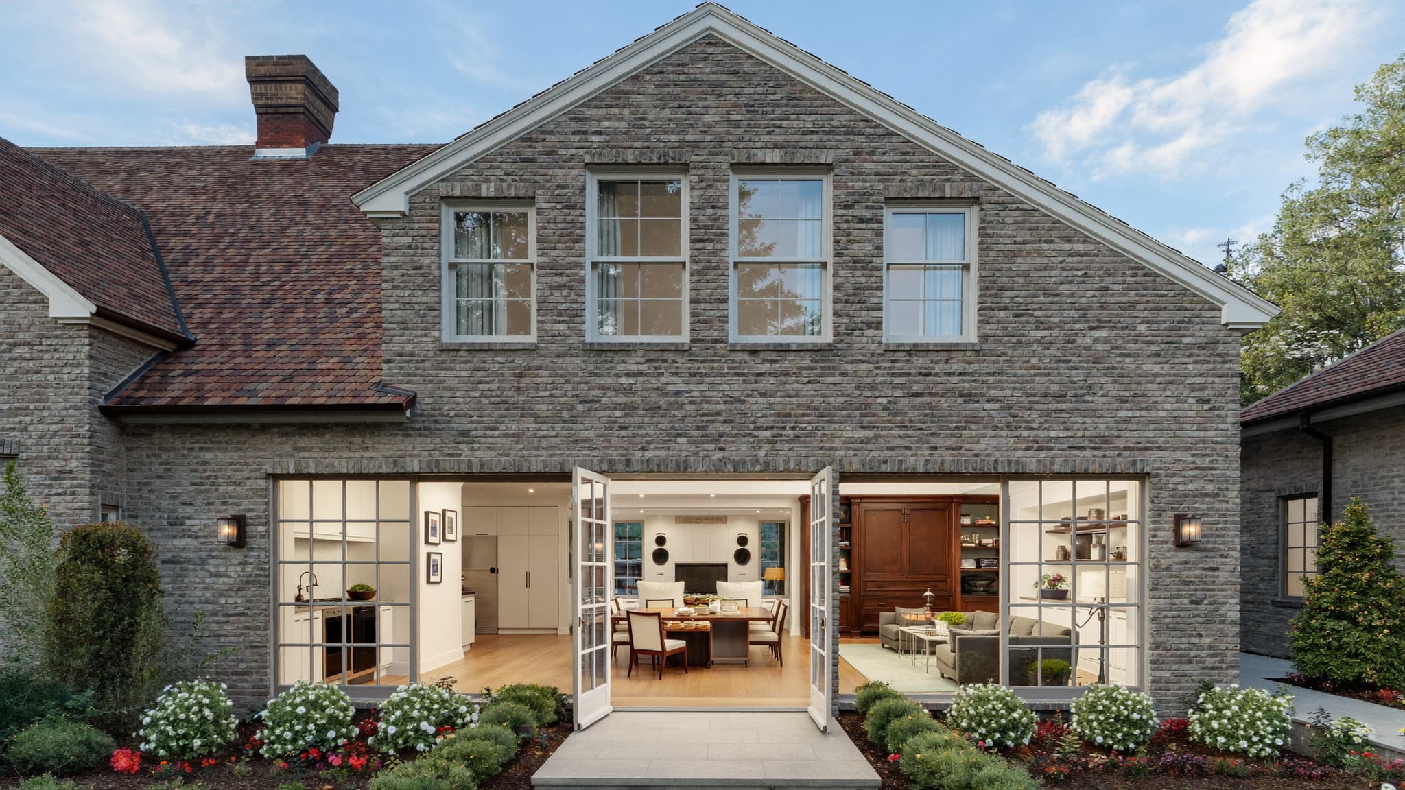 A traditional house updated for modern living, blending classic architecture with smart home features, energy-efficient systems, and contemporary interiors.
